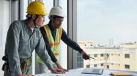 Construction Workers Wearing Safety Helmets