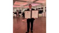 Joshua Zinder Accepting Distinguished Service Award from AIA New Jersey